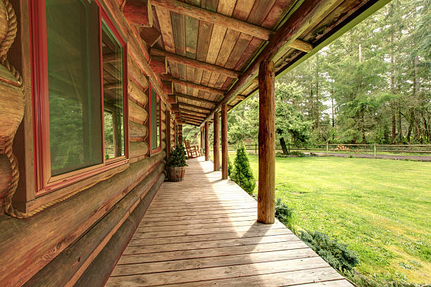 istock Front porch of the old rustic log cabin. 481017633