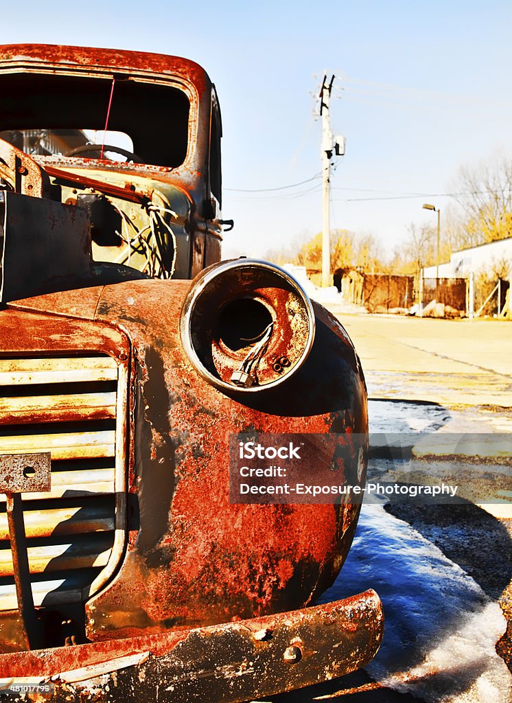 Vintage Truck Front view of vintage, old rusted pick up truck. Abandoned Stock Photo
