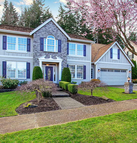 State of the art home with blue theme and grass.