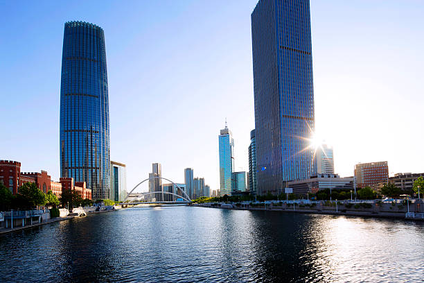 istock Modern buildings and river in urban city 481019900
