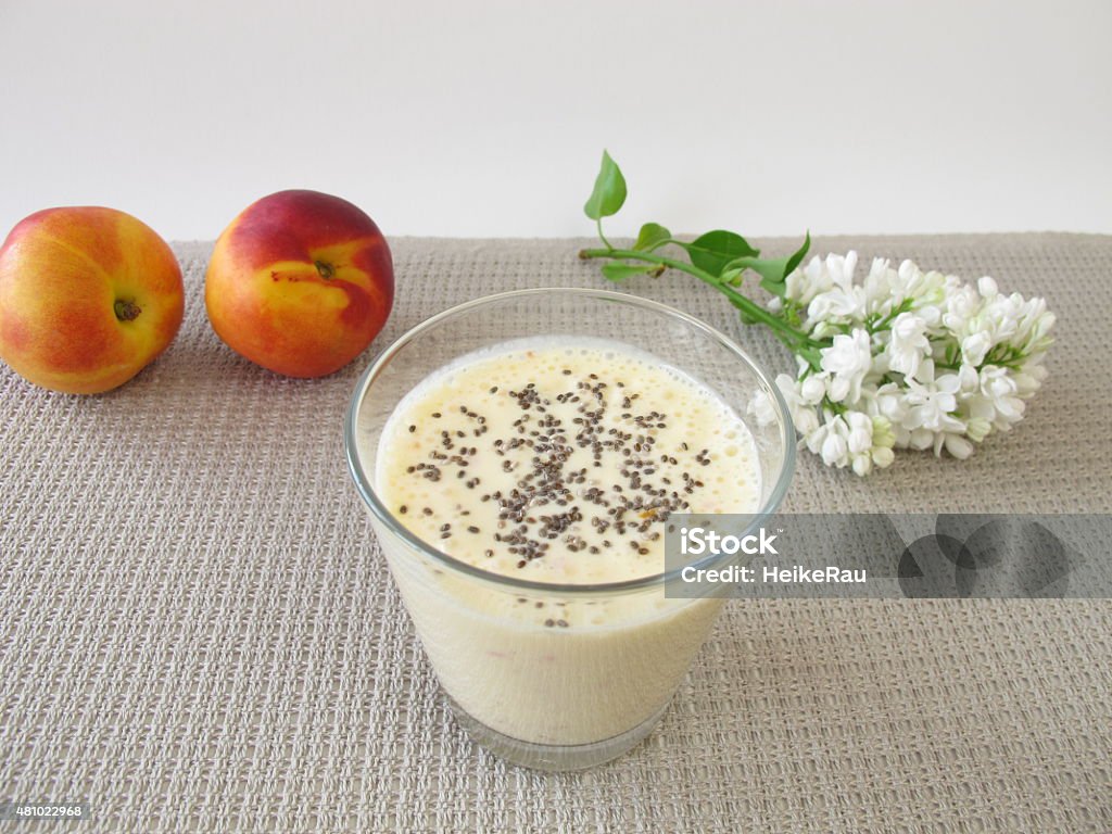 Yogurt drink with nectarine and chia seeds Yogurt drink with nectarine and chia seeds - Trinkjoghurt mit Nektarine und Chiasamen 2015 Stock Photo