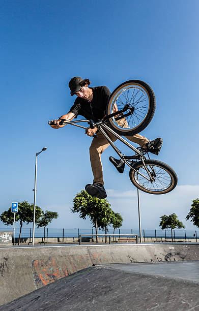 istock BMX rider jumping in urban environment 481024850