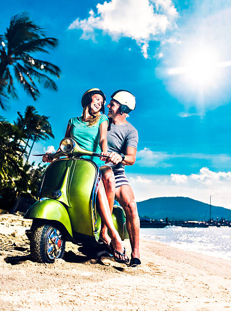 istock Couple on the beach with retro bike 481026319