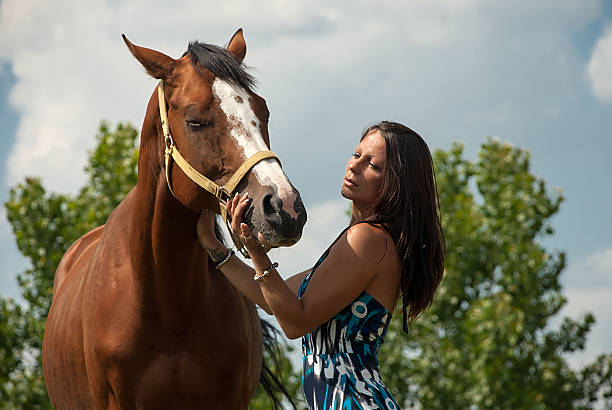 istock Young Woman with Horse 481027000