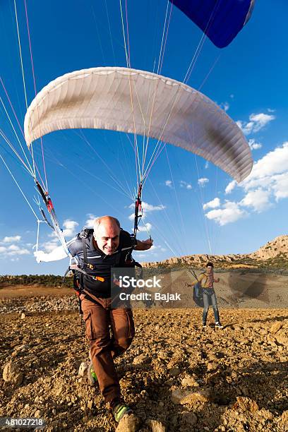 Paraglider Take Off Stock Photo - Download Image Now - Activity, Adult, Adventure