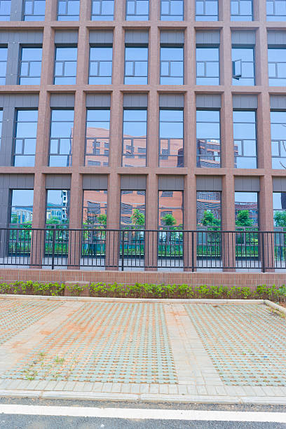 istock Parking space and building with glass wall 481027606