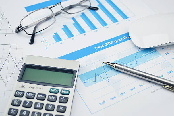 istock Pen and glasses on financial chart and graph, accounting background 481028680