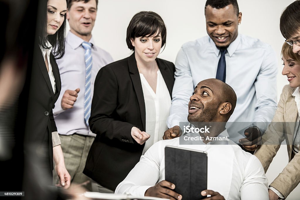 several business men and women meeting in an office Business people on meeting in office, happy with business results. Financial Result Stock Photo