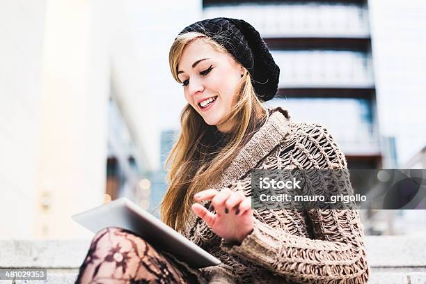 Woman Using A Digital Tablet Outdoor Stock Photo - Download Image Now - Autumn, Digital Tablet, Winter