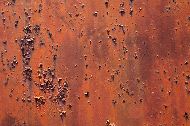 Textured rust on metal gate Java stock photo