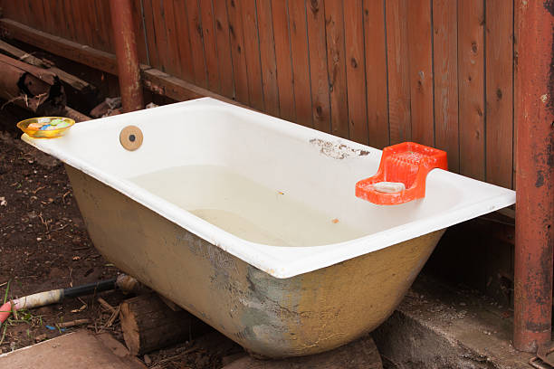 istock old cast-iron bath stands in a vegetable garden 481030791