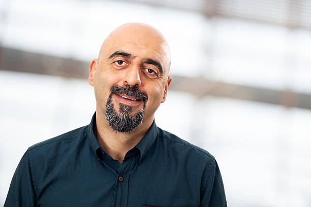 istock Portrait of smiling man 481034556