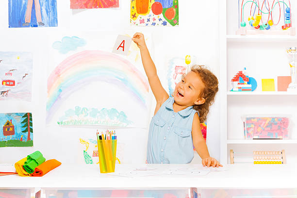 istock Happy little girl learn first letters 481034576