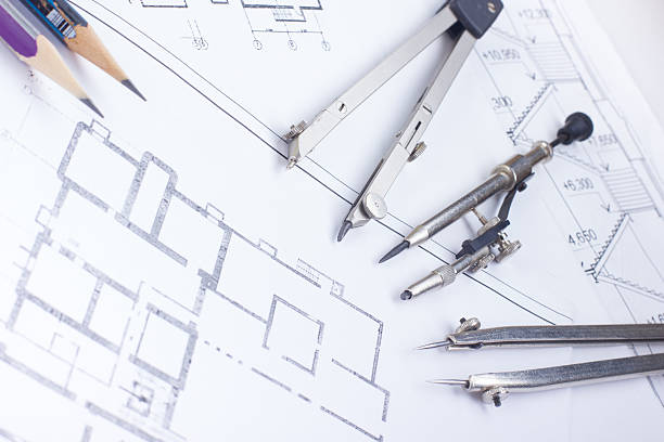 istock Architectural project, blueprints, divider compass, calipers, pencil, calculator on plans 481035282