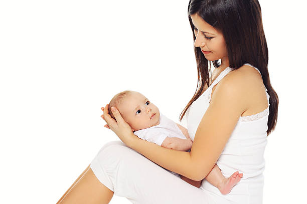 istock Happy young mother holding on hands cute baby 481035476