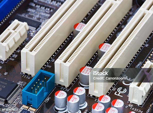 Closeup Of Electronic Circuit Board Stock Photo - Download Image Now - Blue, CPU, Capacitor