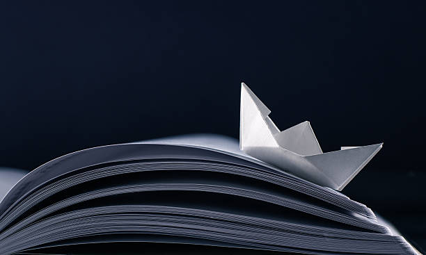 Paper boat stock photo