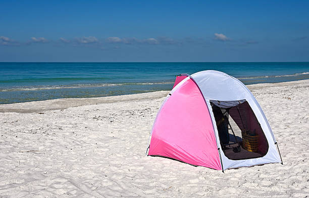 A Pink and White Portable Children's Shelter Beach Tent
