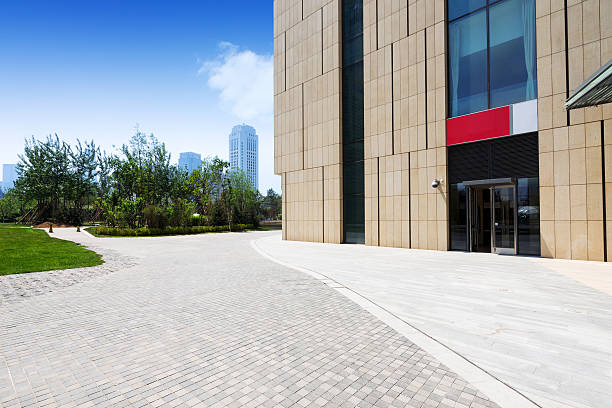 istock modern building exterior with brick road floor 481040858