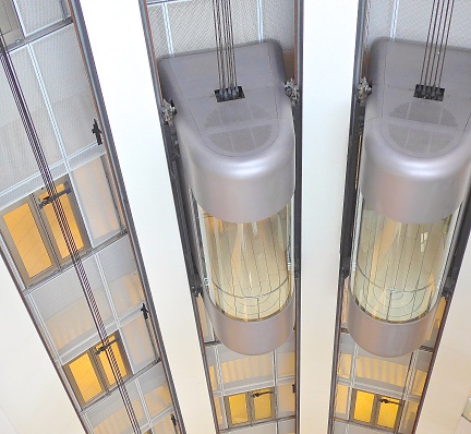 Exposed elevators shuttled in the department store