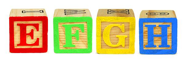 istock Toy wooden letter blocks E F G H 481041268