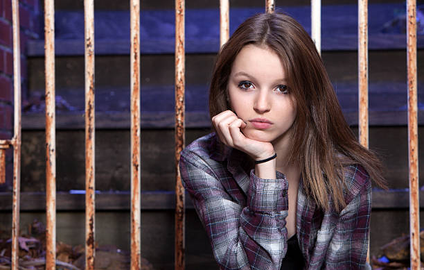 Thoughtful young woman waiting for her boyfriend