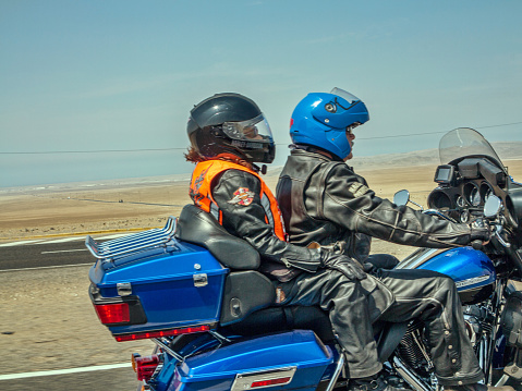 Huaral, Peru - January 22, 2015: Harley Davidson Motorcyclists on the pan-american highway in Peru