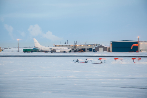 Plane docked at airport in Prudhoe Bay, Alaska