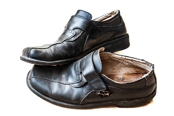 istock man leather black shoes on white background 481046599