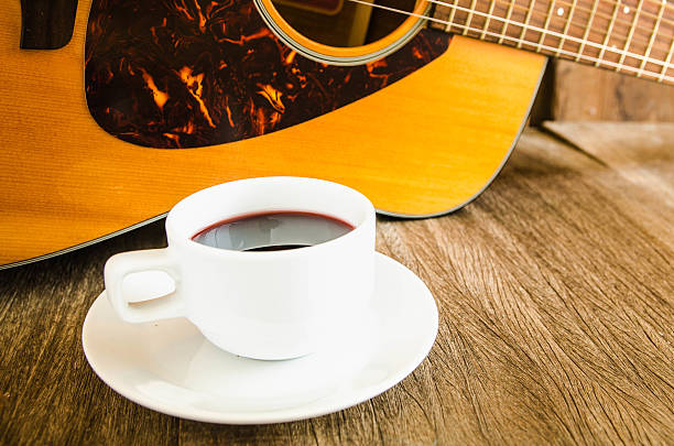 istock Coffee and acoustic guitar on board 481048364