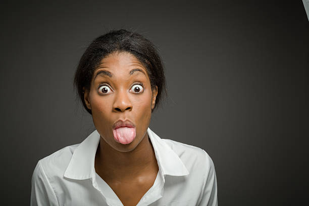 istock Model isolated sticking tongue out 481051548