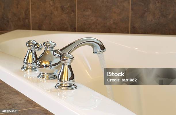 New Chrome Faucet In Master Bath Tub Stock Photo - Download Image Now - Architecture, Bathroom, Bathtub