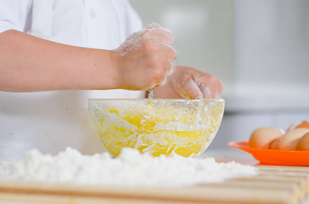 istock Little boy mixing cake ingredients 481055294
