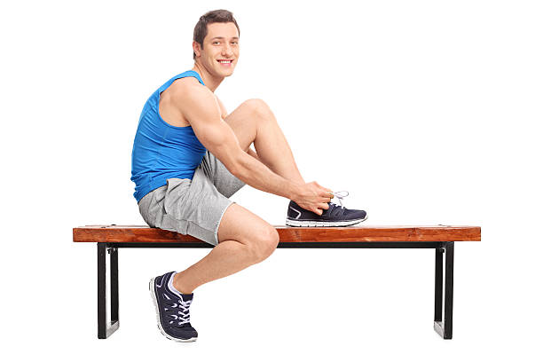 istock Young male athlete tying his shoelaces 481055956