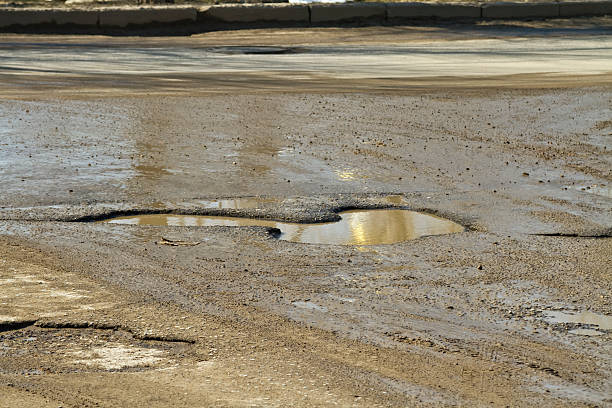 istock Huge traffic pothole in the pavement 481056567