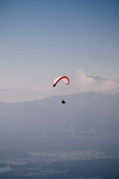 istock Paraglider over Austrian Alps with Karawanken Range on background 481057563