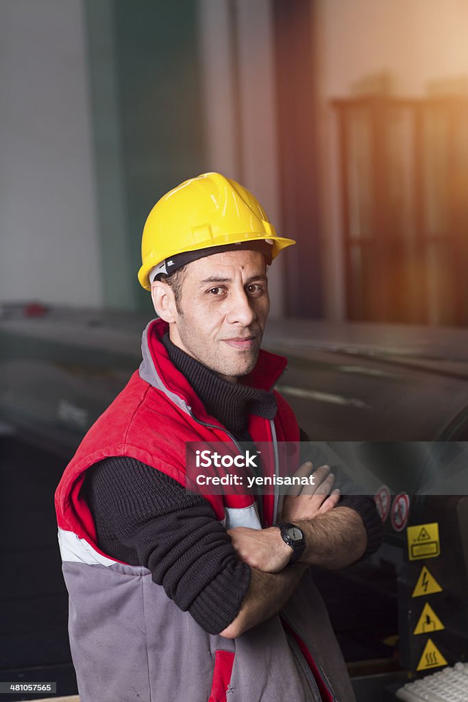 Stock Machine Operator Machine Operator Working At Factory Stock Photo - Download Image Now ...