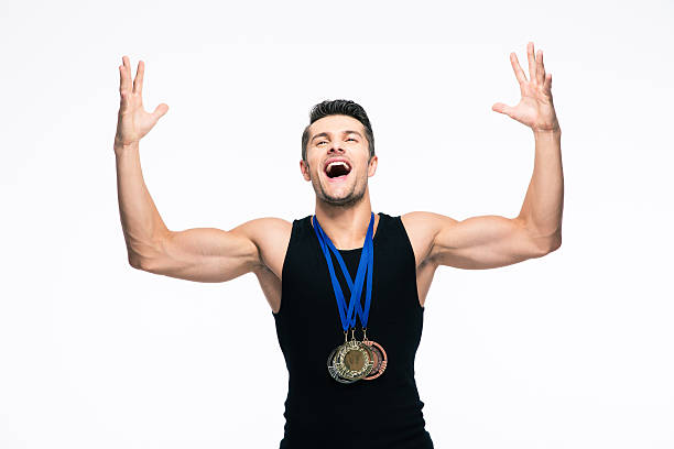 istock Fitness man with medals celebrating his success 481060630