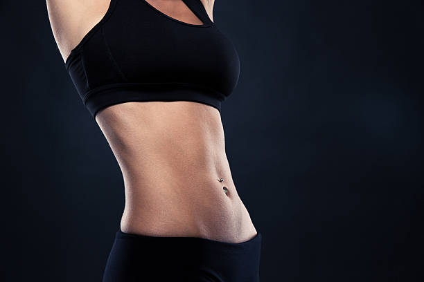 istock Closeup of a fit woman's abs 481063042
