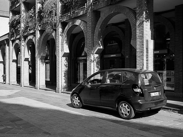 Busto Arsizio, Italy - March 18, 2014: Mercedes Benz Car parket in a street of the city. Photo taken in a public area