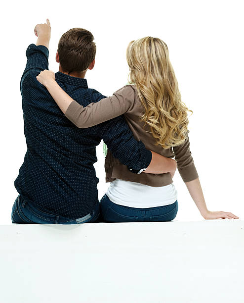 istock Rear view of couple on box and pointing 481068888