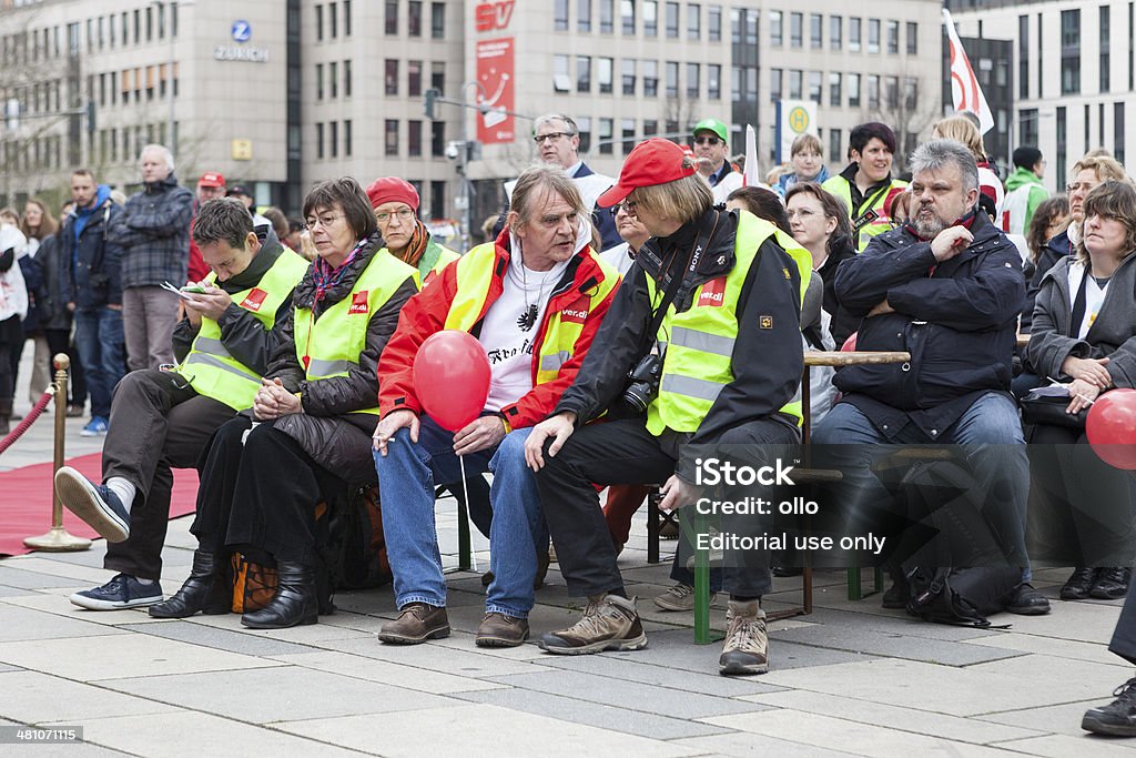 Warning strike and demonstration of german trade union verdi, Wi Wiesbaden, Germany - March 19, 2014: Participants of a warning strike and demonstration for higher wages in public services in the city center of Wiesbaden, Germany. The demonstration was organized by german trade union verdi. Activity Stock Photo