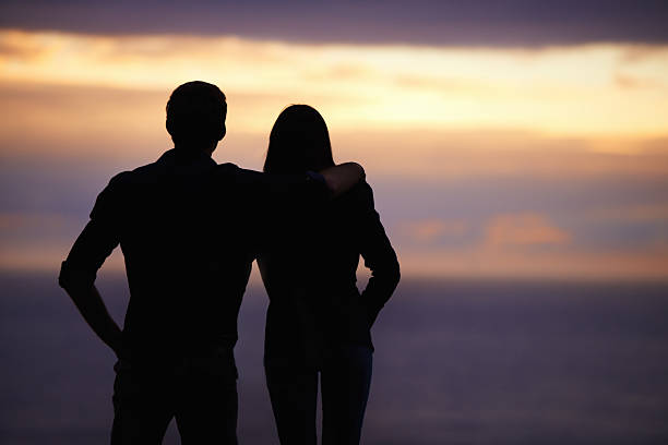 istock Admiring the beauty of sunset - side by side 481071841