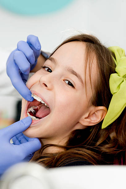 istock Little girl at orthodontist 481072539