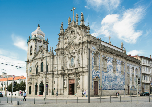 Porto, Portugal - September 26, 2013: Two churches: Carmelite church and Carmo church are separated by world narrowst house - one meter in with. The house between churches was inhabited until 1980s. 