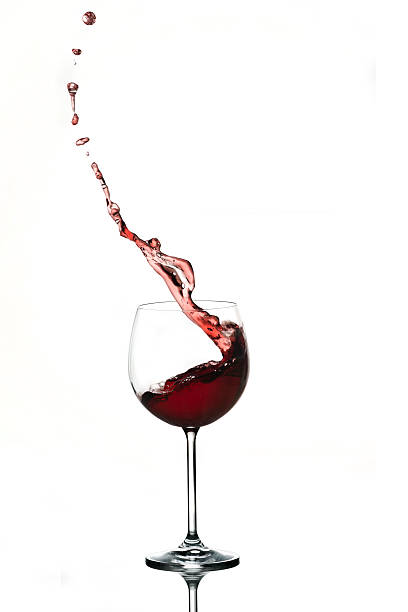 istock Red Wine Splashing In A Glass 481072757