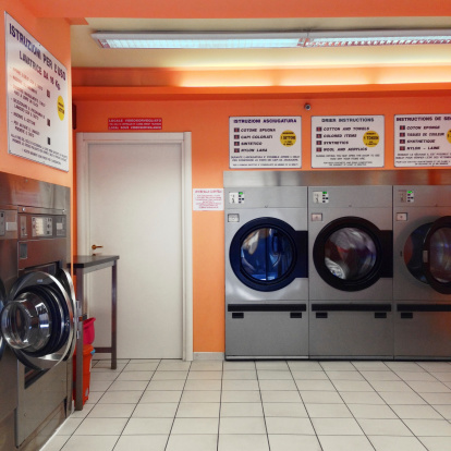 Laundromat, photographed in Italy with an iPhone 5 from the public street.