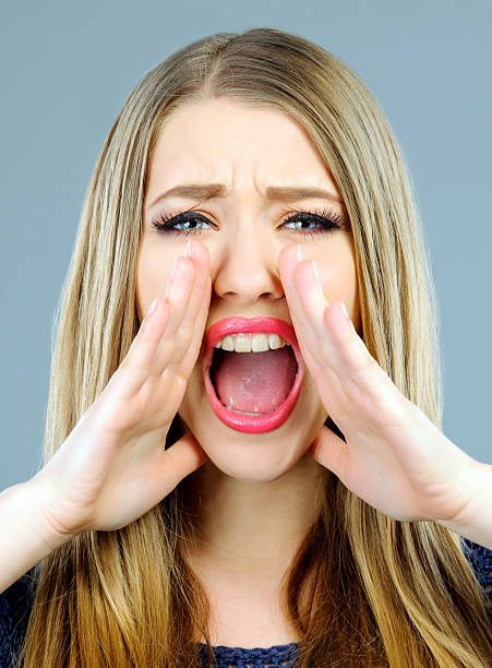 istock woman shouting news 481074707