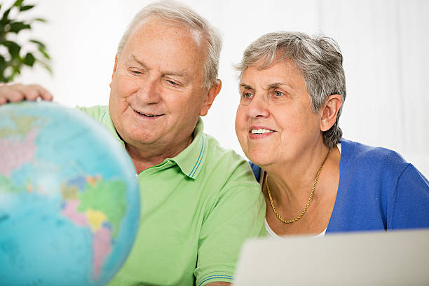 istock Senior couple planning travel destination 481075171