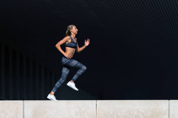 istock Young Woman Running 481080684